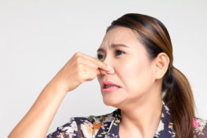 Woman Closing Close Because Of Bad Smell