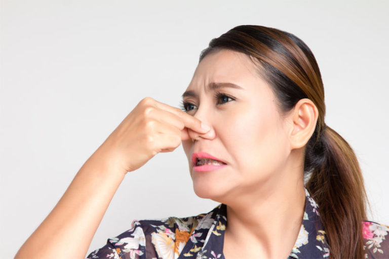 Woman Closing Close Because Of Bad Smell