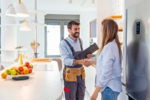 Contractor Shaking Hands With Client